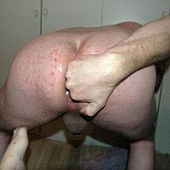Female to male anal fisting.